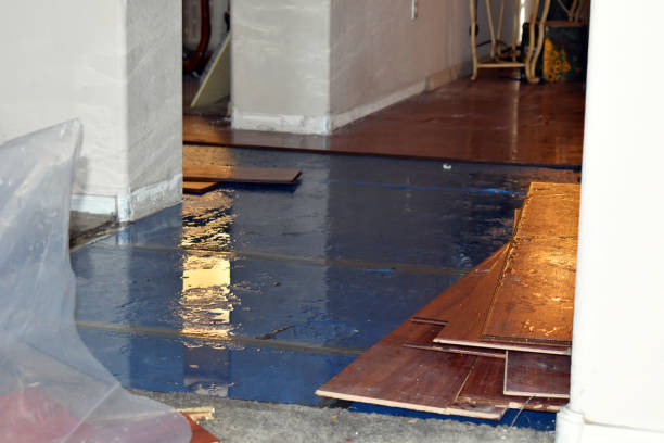 Professional Flood Damage Restoration technician working in Plover, WI